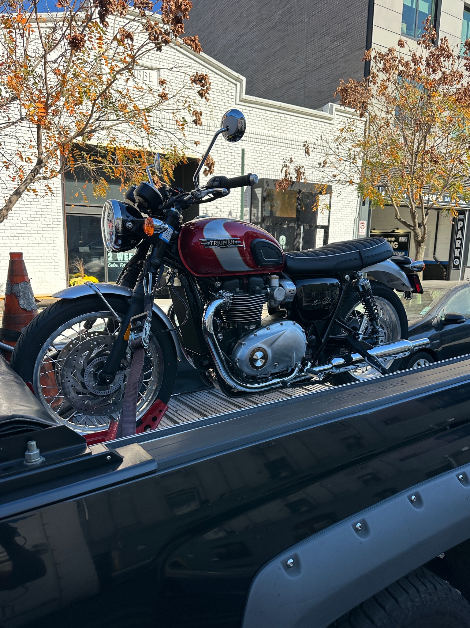 Classic road motorcycle strapped to the transport deck