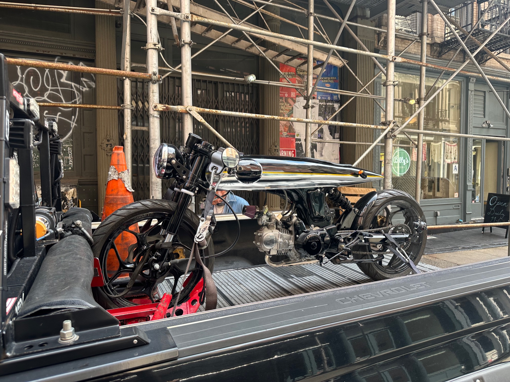 Vintage motorcycle secured on the transport deck