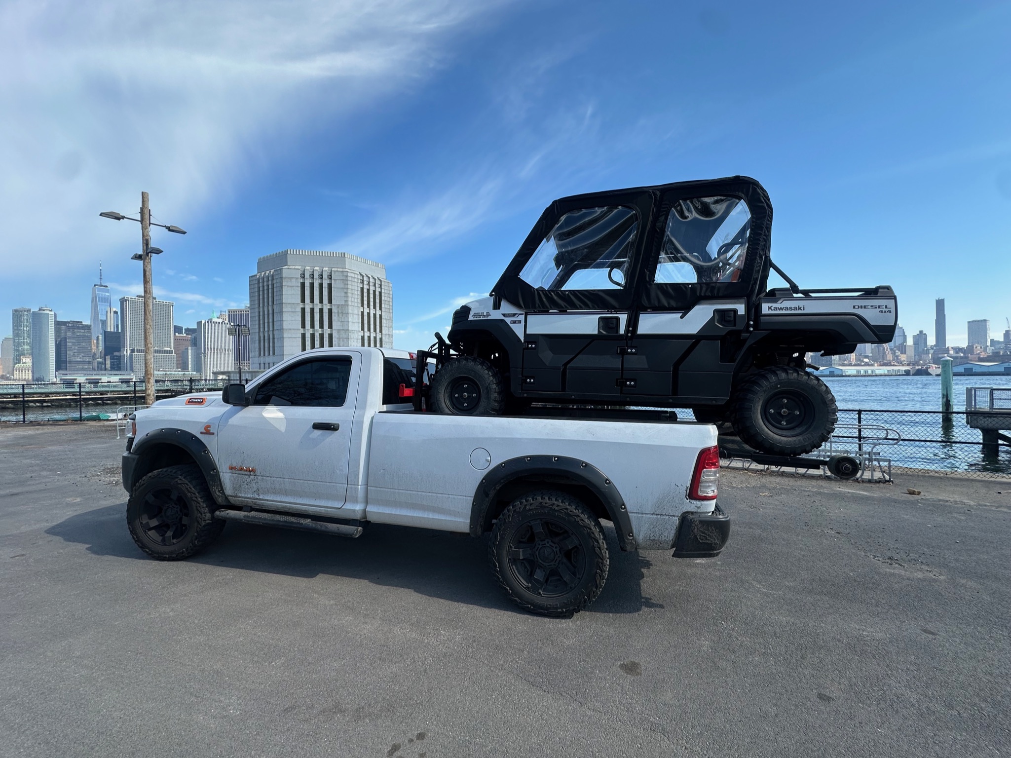 Side-by-side UTV carried by the MAD Transpo NYC white truck