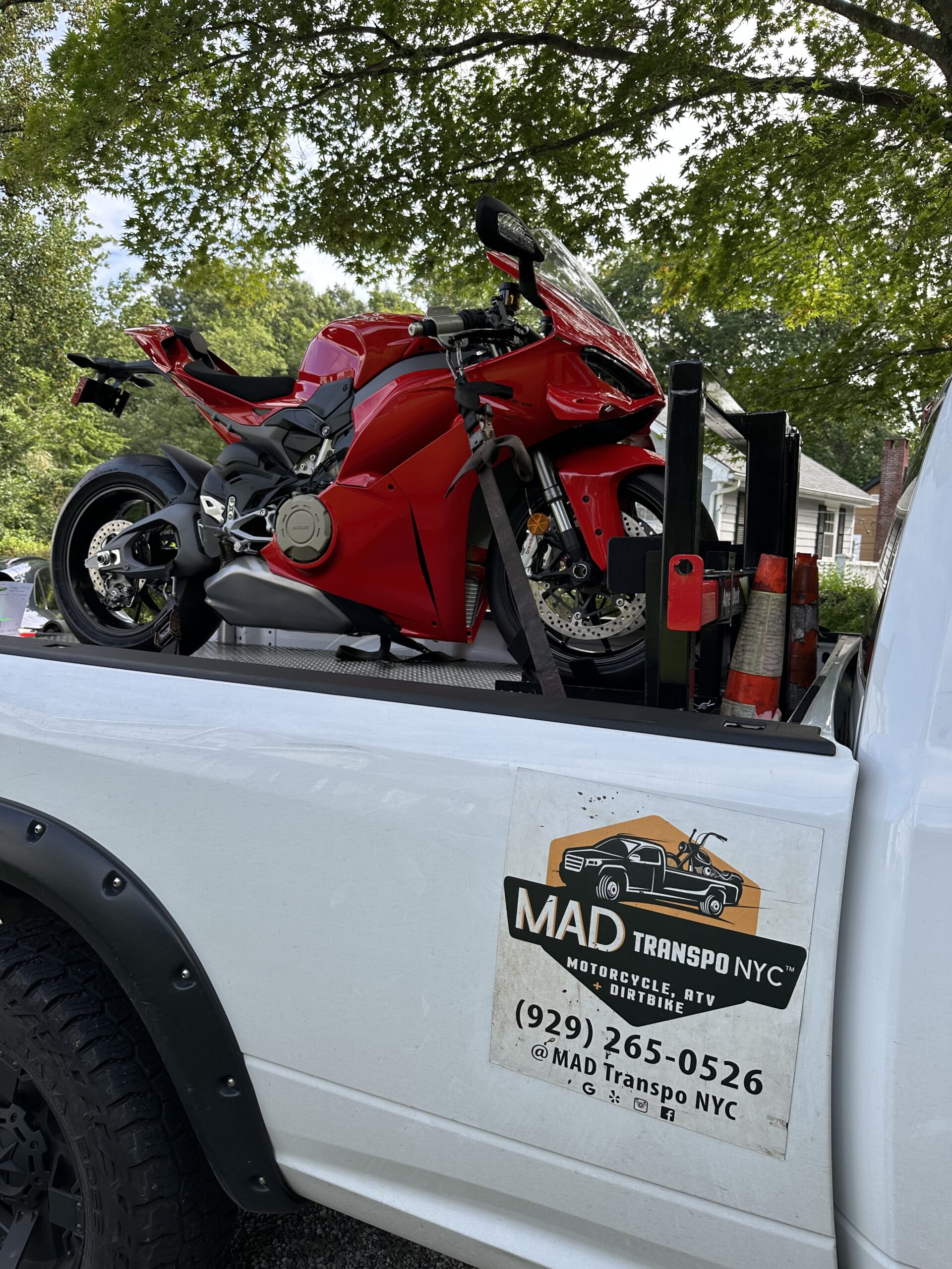 Ducati motorcycle secured on the MAD Transpo NYC white pickup
